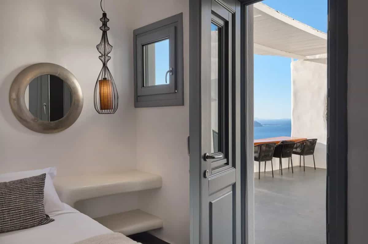 Caldera view room interior at Aroma Suites Fira