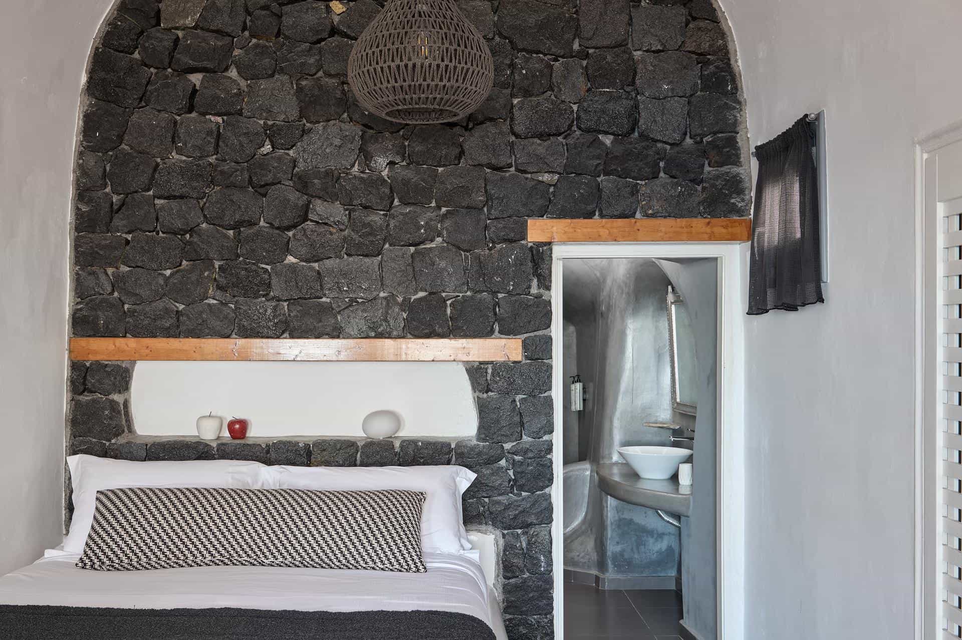 Cave suite with Jacuzzi and atmospheric lighting