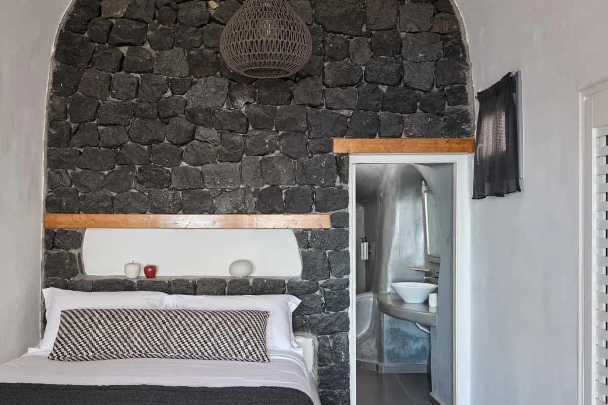 Cave suite with Jacuzzi and atmospheric lighting