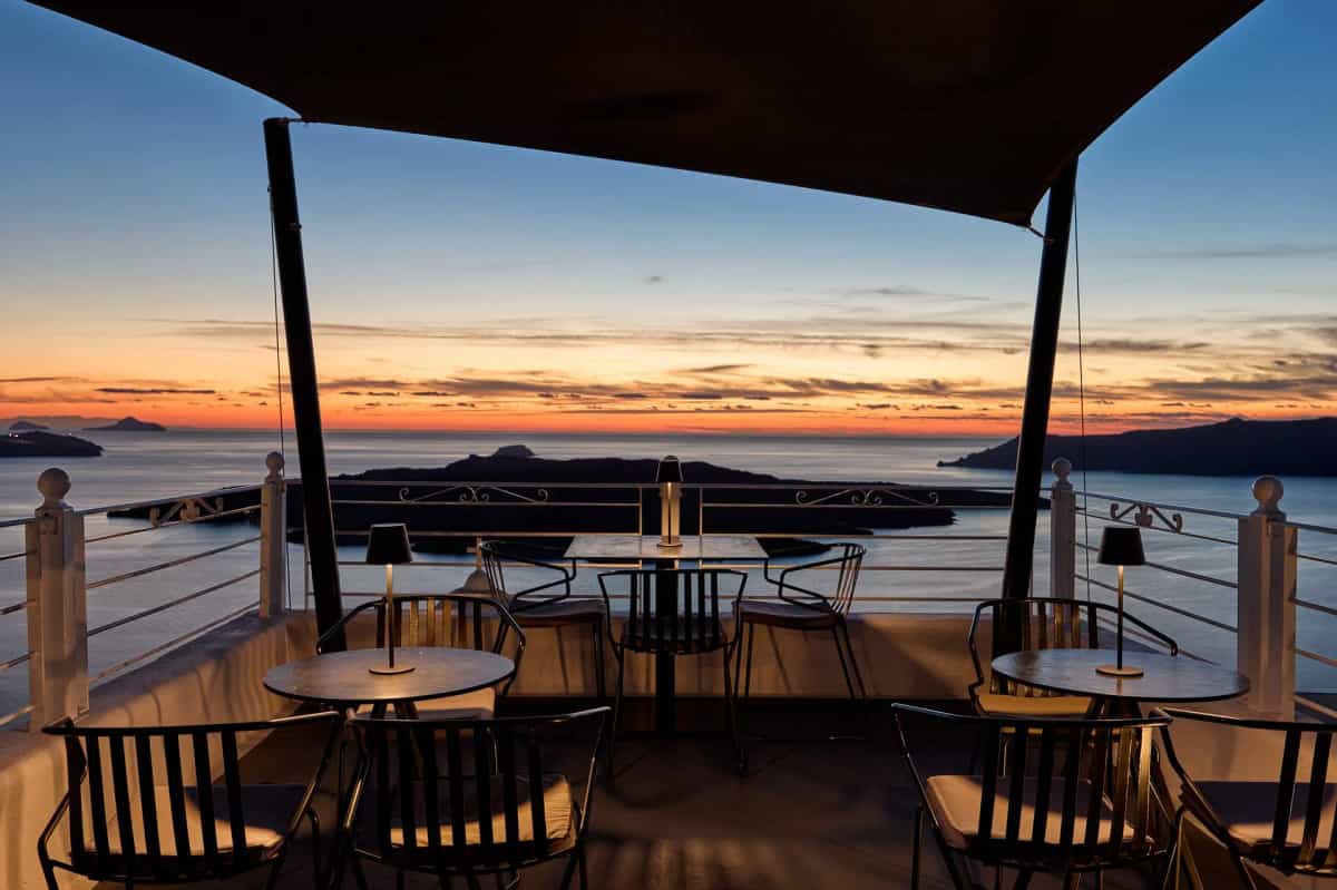 Vibrant sunset sky over the Santorini caldera and sea