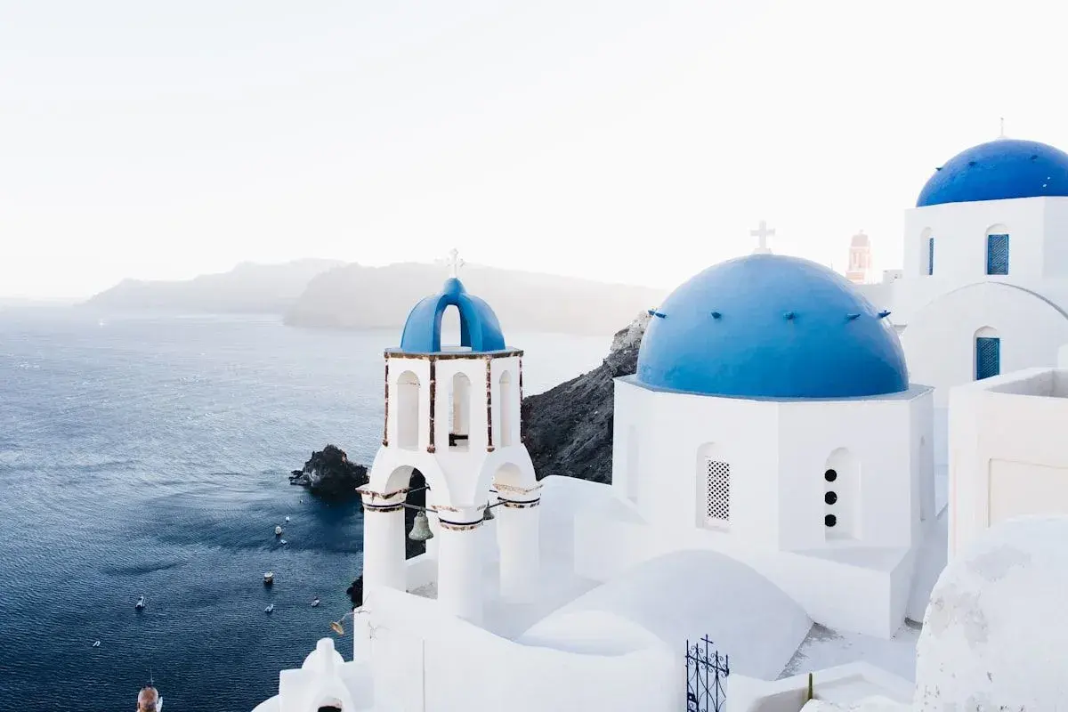 Blue-domed churches above the caldera in Oia