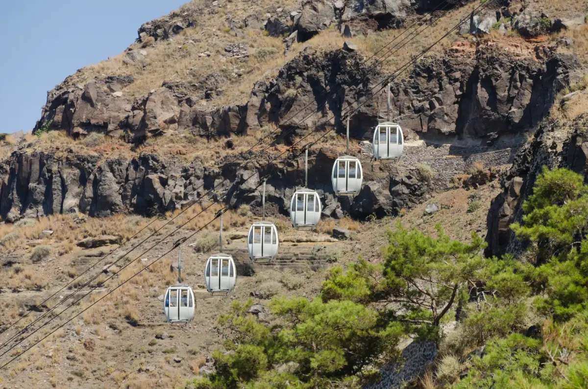 Santorini cable car cabins on the cliff between Fira's old port and the town