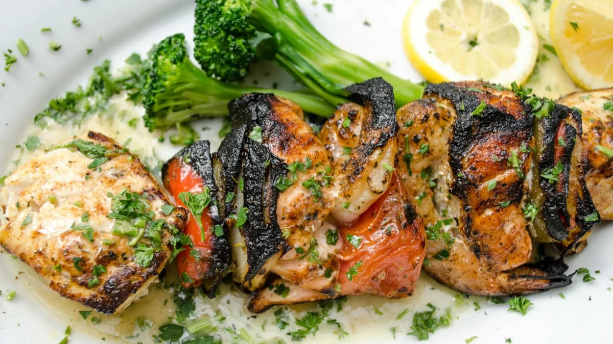 Traditional Santorini dishes including fava and tomatokeftedes served at a Greek taverna