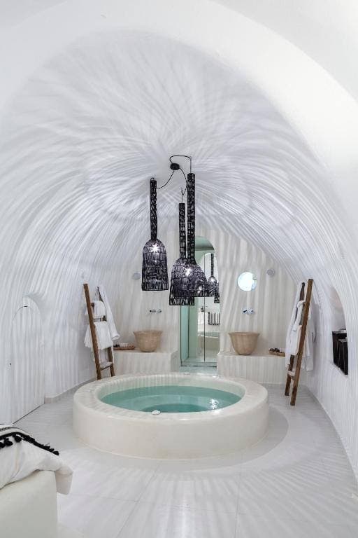 Romantic honeymoon suite with caldera view at Aroma Suites Fira Santorini