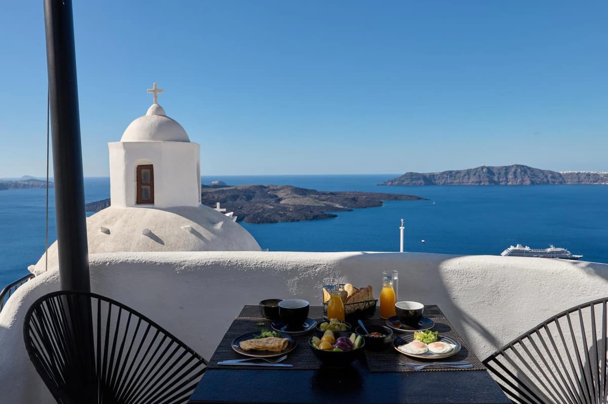 Santorini caldera sunset from Aroma Suites