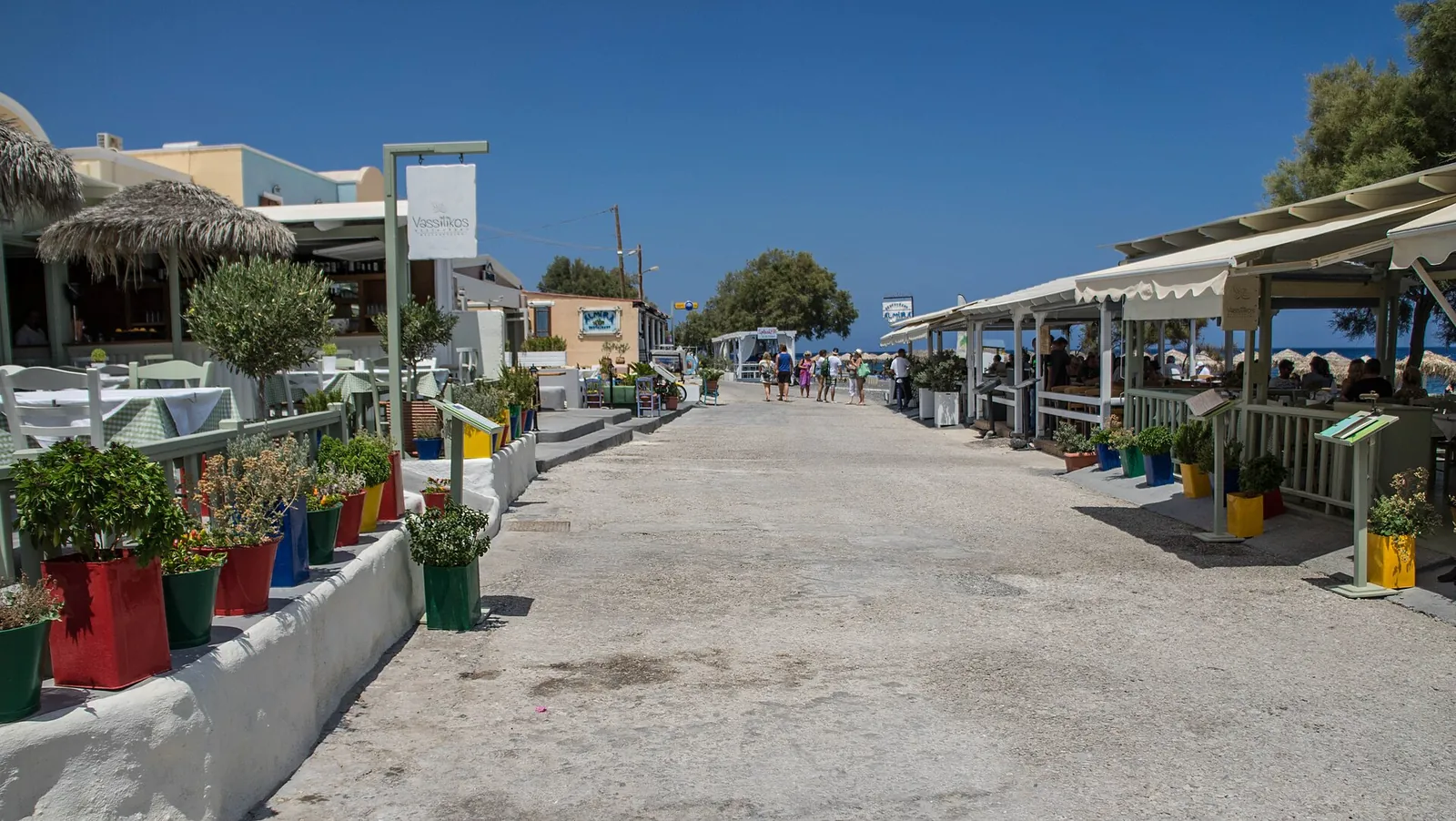 Flat, car-free seafront promenade at Kamari, lined with tavernas