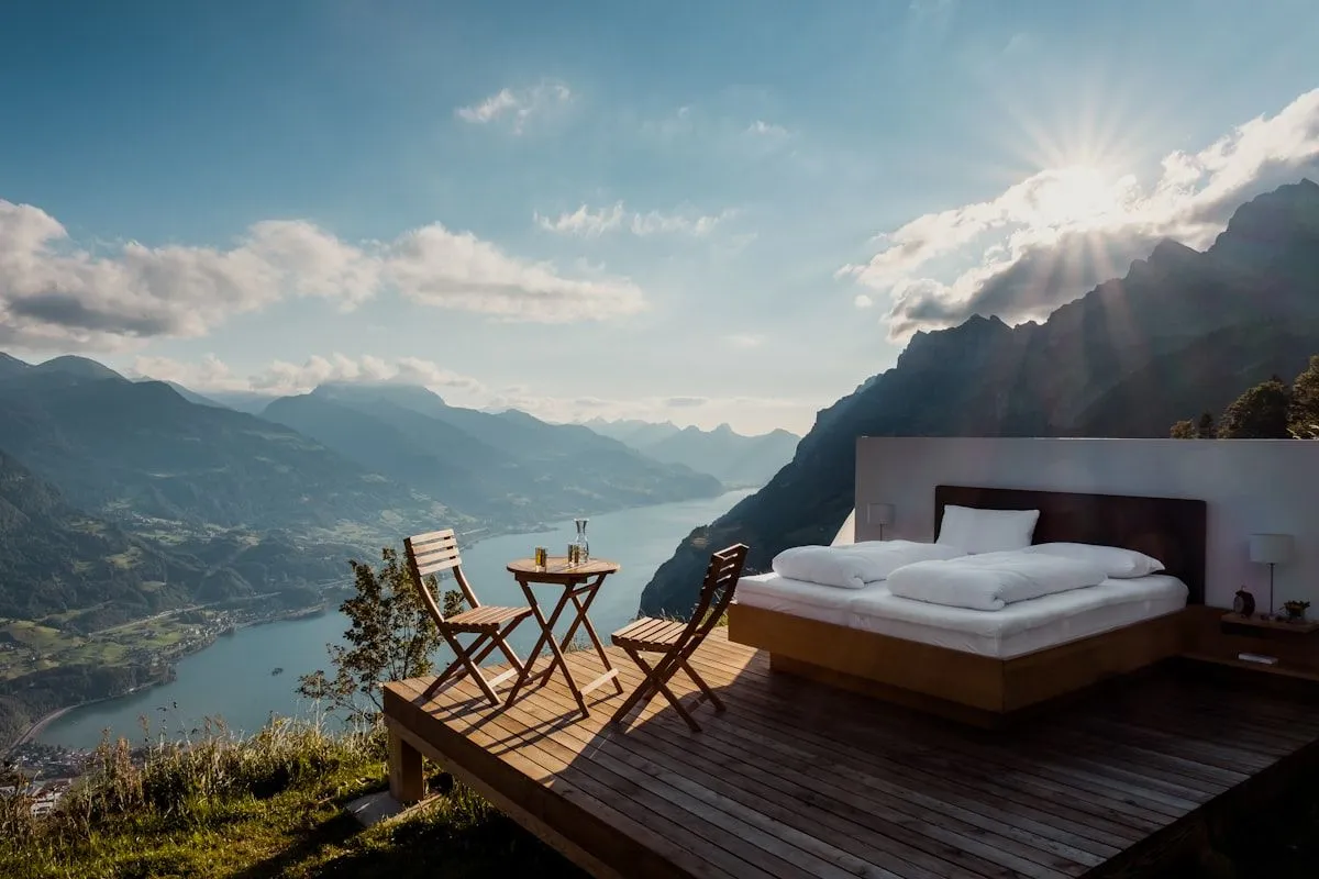 Romantic dinner table set for two with caldera views in the background