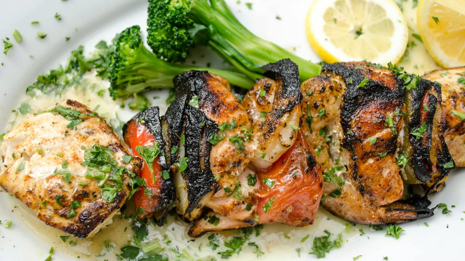Traditional Santorini dishes including fava and tomatokeftedes on a Greek taverna table